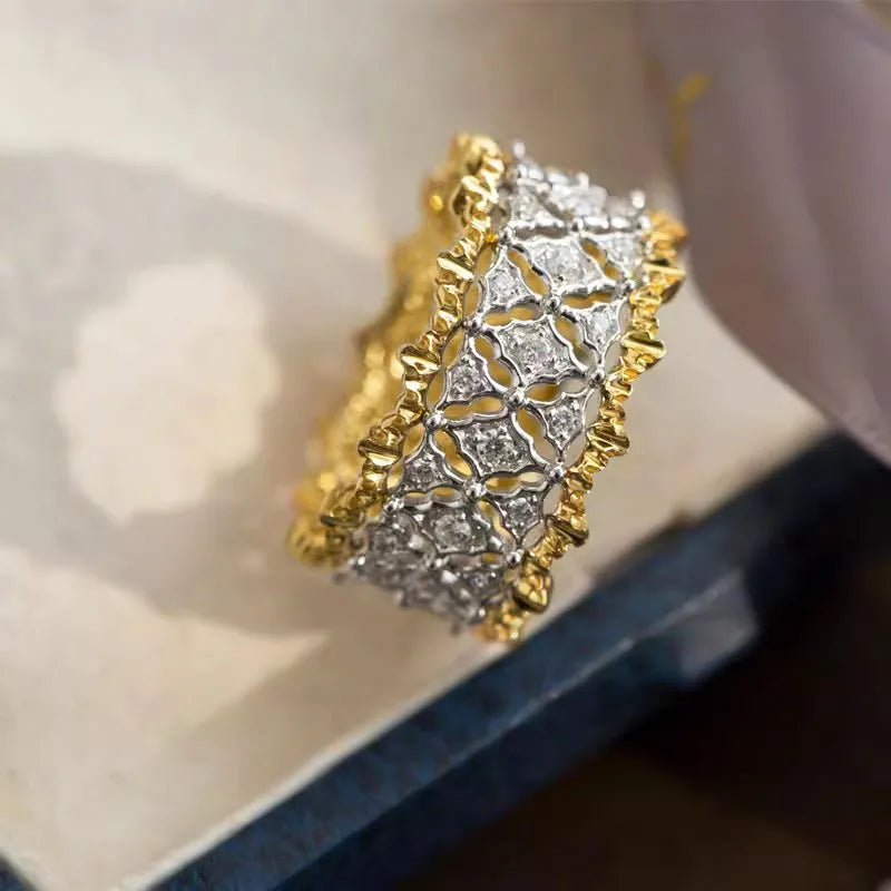Two-tone gold geometric ring with round zircon on electroplated copper