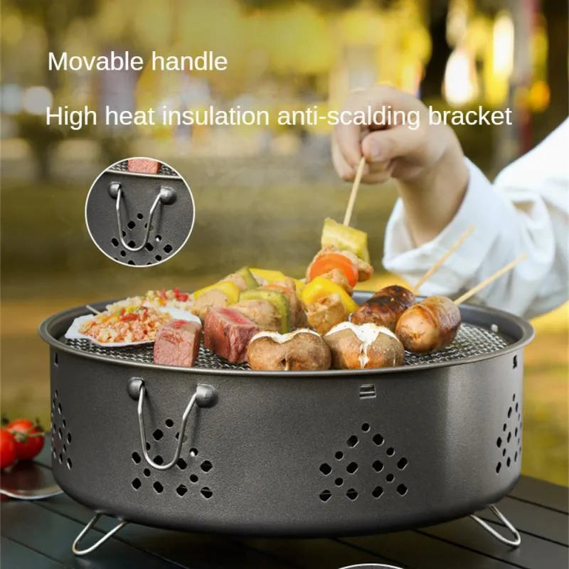 Portable stainless steel charcoal barbecue grill with detachable parts and a carry bag.