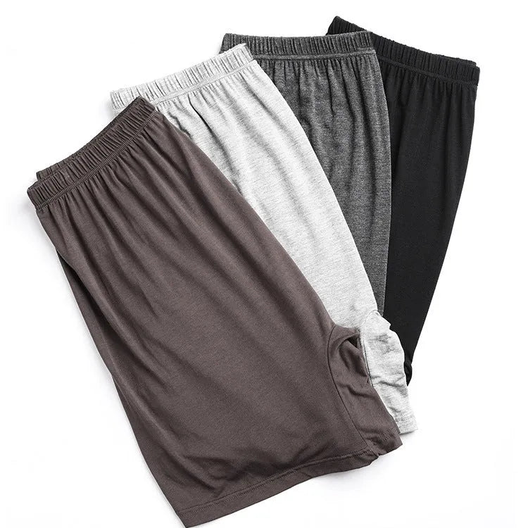 Men's solid colour modal boxer shorts on a white background, showing high waist design.