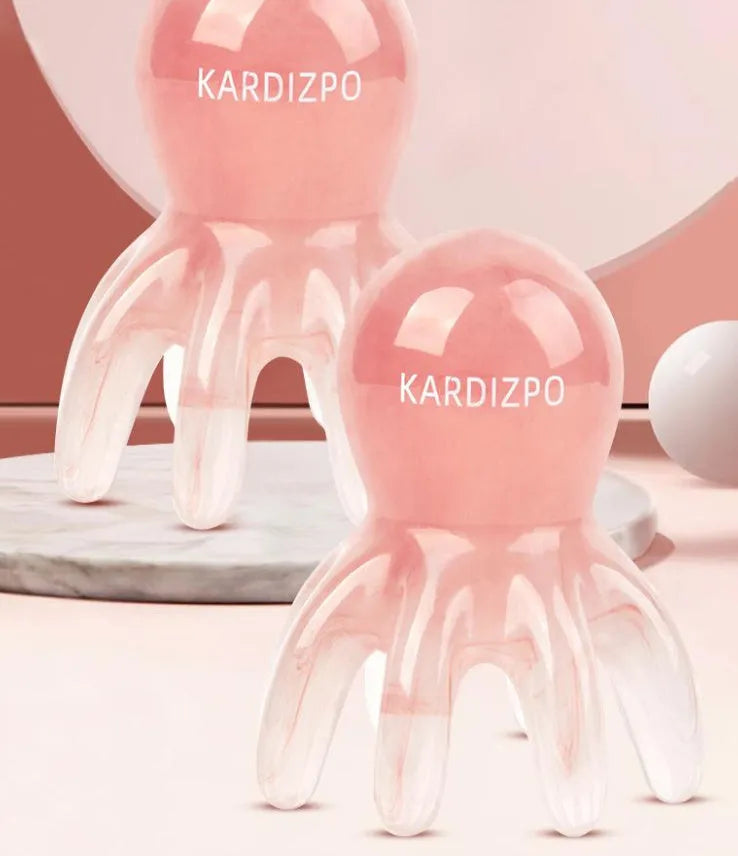 Pink natural resin octopus-shaped massage comb for face and scalp with storage bag