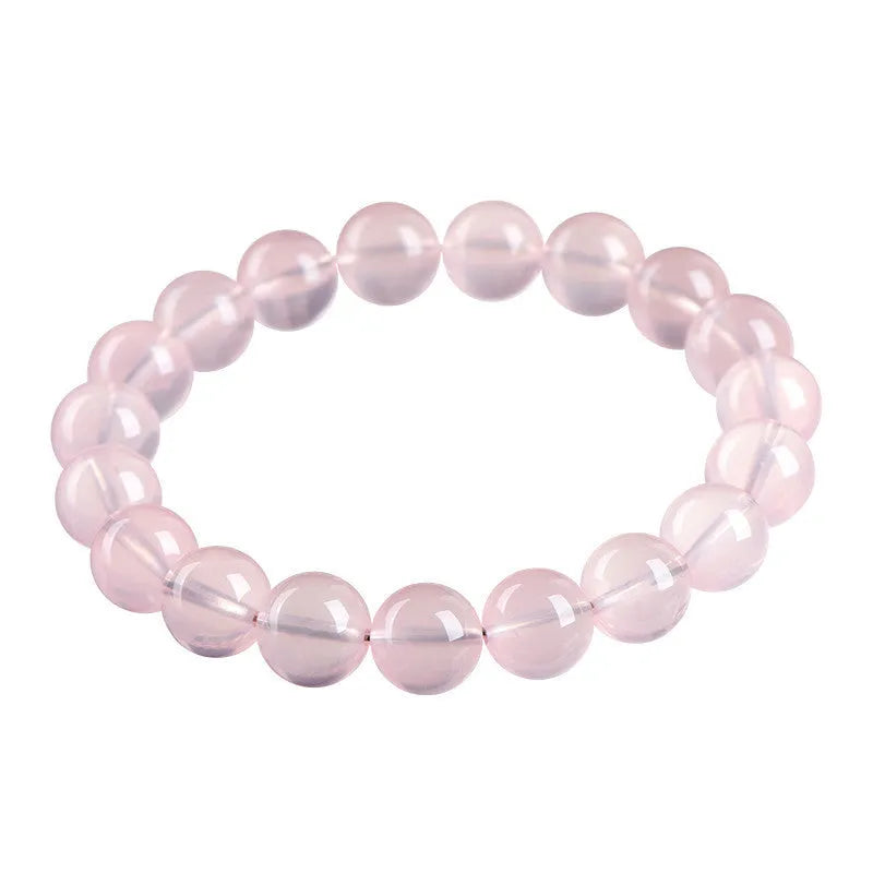 Natural starlight crystal round bead bracelet for women in polished pink with single circle construction