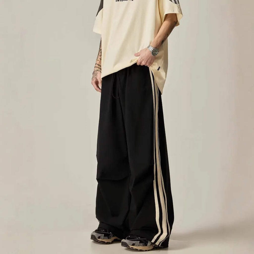 Black wide leg climbing trousers with high-waist design and straight leg cut for men