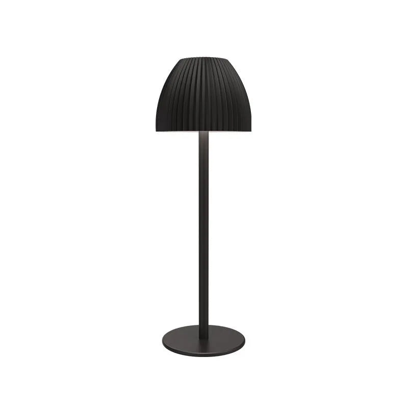 Modern small night lamp with thin round base in black or white, featuring dimming controls