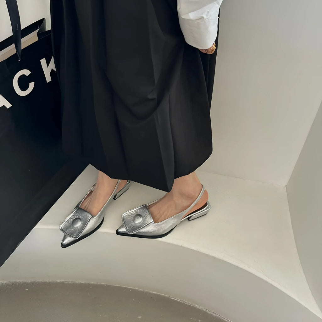 Women's low heel pointed toe sandals with back strap in apricot, black, brown, and silver colours.