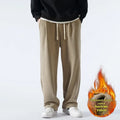 Men's polar fleece sports trousers with fleece lining in apricot, black and dark grey colours