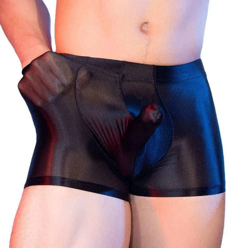 Men's red elephant nose boxer shorts made from thin nylon fabric, showing mid-waist and seamless design.