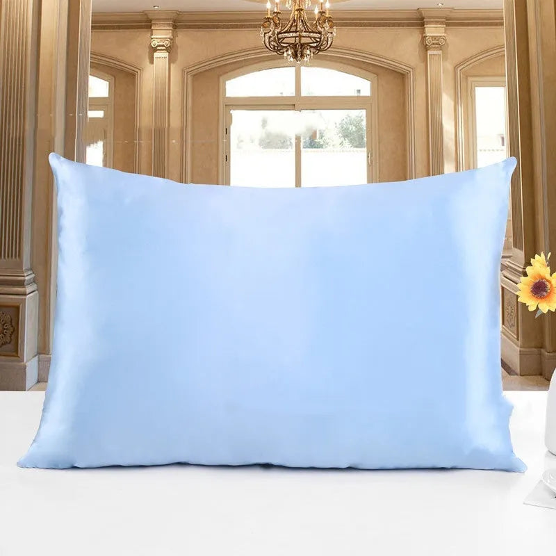 19 M double-sided silk pillowcase in apricot colour showing smooth texture and hem detail.
