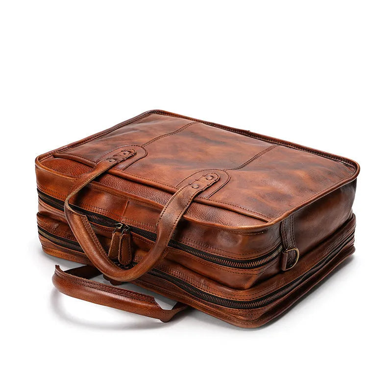 Vintage style leather men's briefcase with multiple internal pockets and 42x15x29cm dimensions