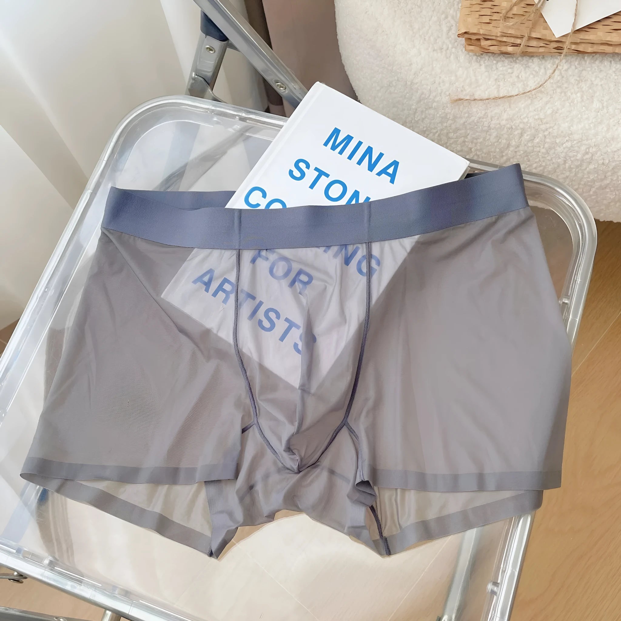 Men's seamless boxer shorts in quick-drying nylon fabric, shown in multiple colours including rock ash and Congo red