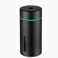 Black aluminium car humidifier and essential oil diffuser with colourful night light on, 66mm wide.