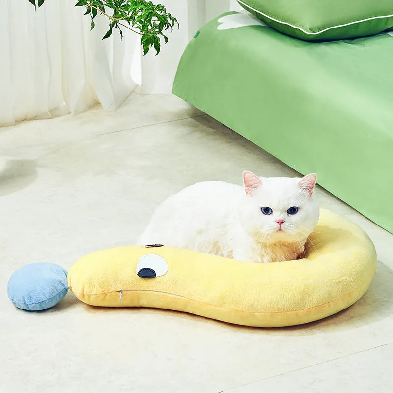 Blue rectangular pet cushion measuring 62cm by 39cm on a floor.