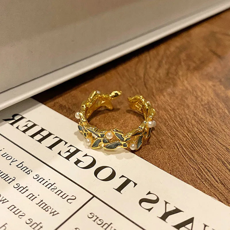 Copper women's ring featuring a creative Chinese butterfly design, available in multiple colours.