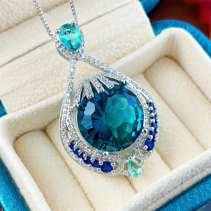 Women's blue crystal geometric pendant necklace with water wave chain and alloy construction