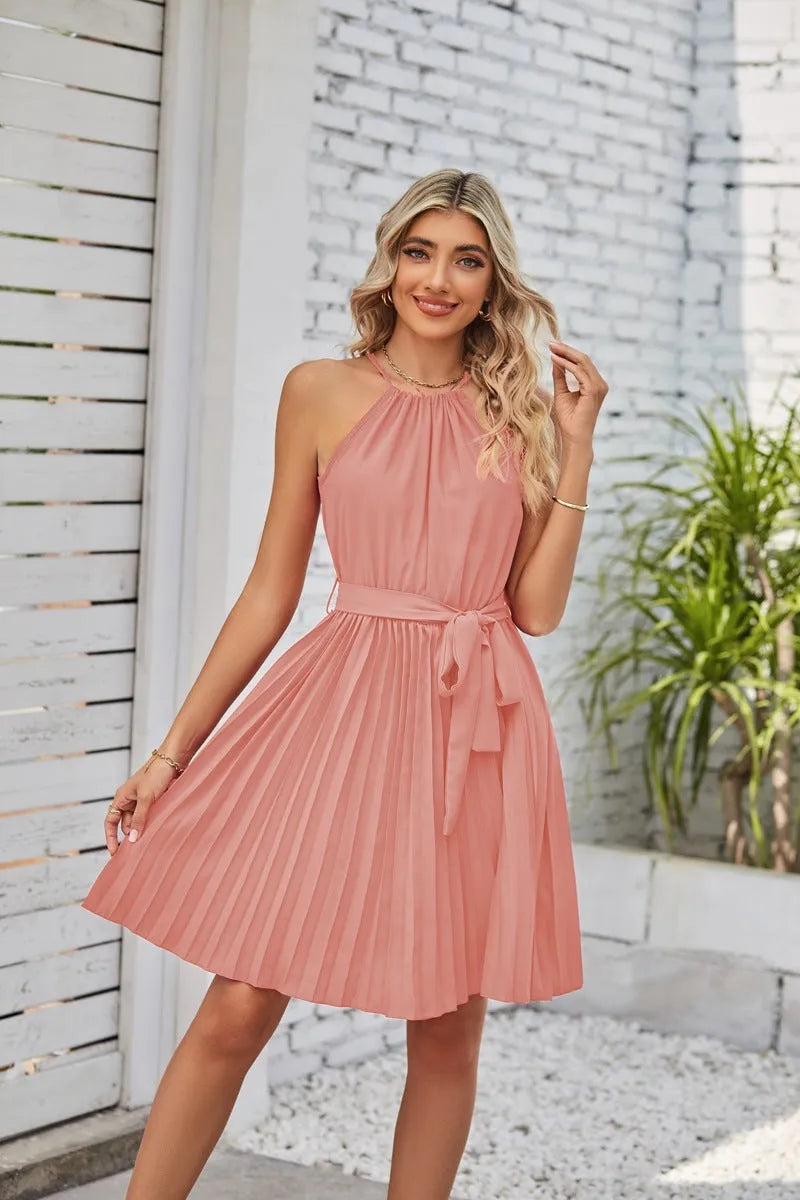 Women's black halter neck strapless dress with pleated midi skirt and waist belt