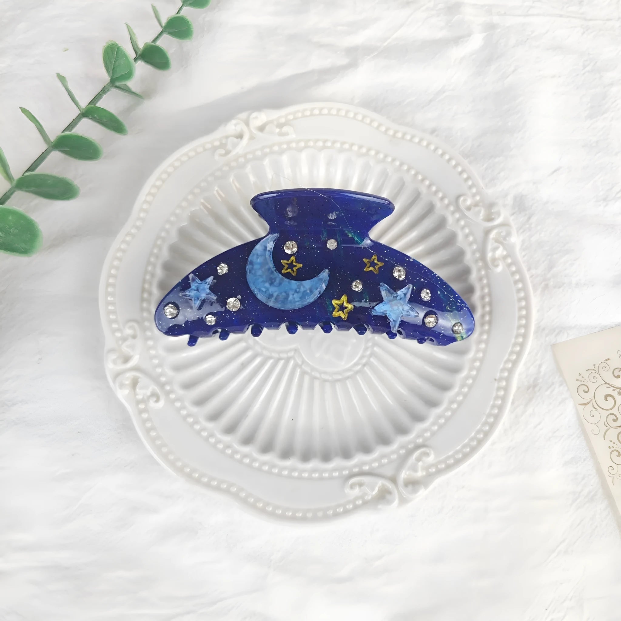 Oversized celestial barrette hair clip with star moon design in starry sky colours
