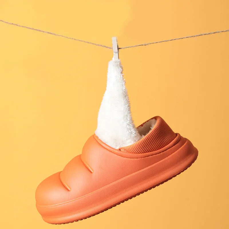 Women's waterproof garden slipper in green with plush lining and a textured non-slip EVA sole.