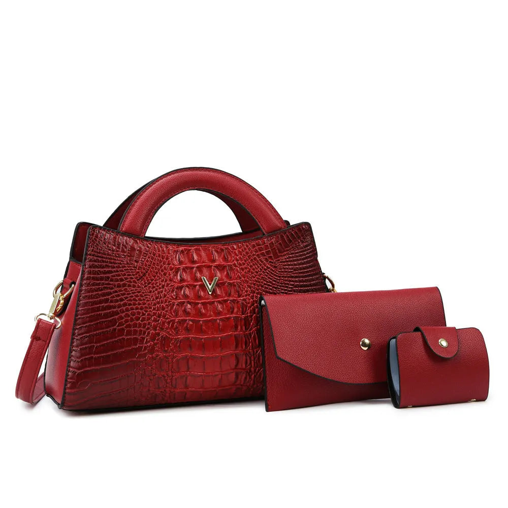 Women's black crocodile pattern PU leather crossbody bag showing internal phone and document pockets.