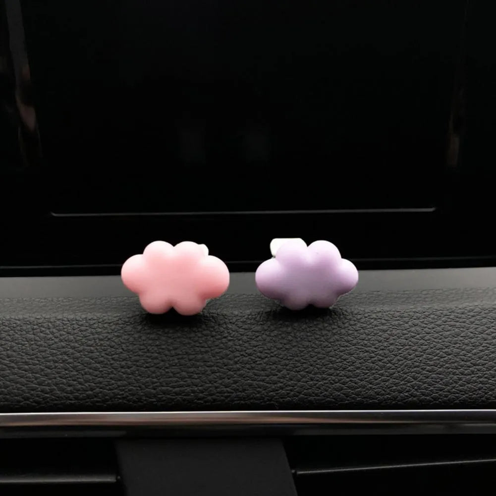 Resin car fragrance clip with Baiyun Cartoon design attached to car air vent