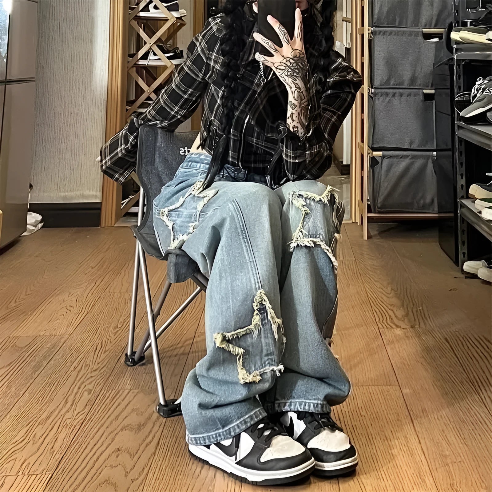 Blue high waist wide-leg denim jeans with straight cut on mannequin