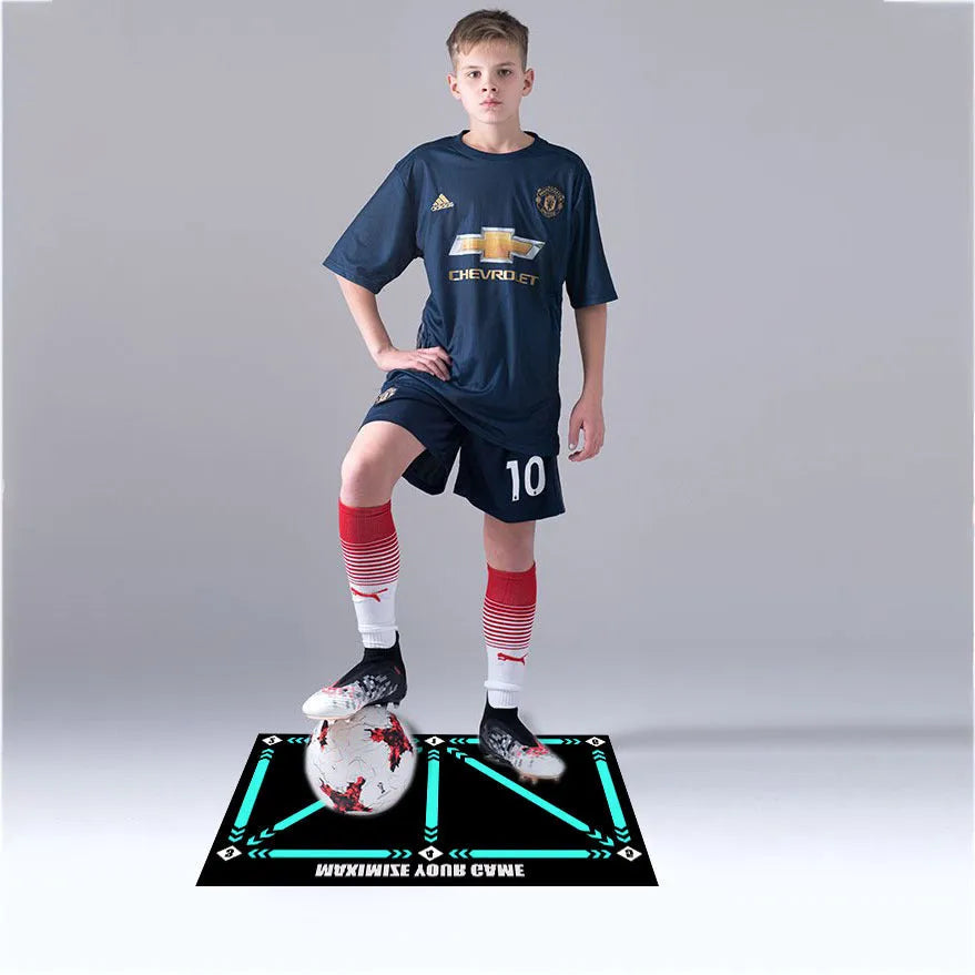 Black rectangular football training mat measuring 60 by 90 centimetres
