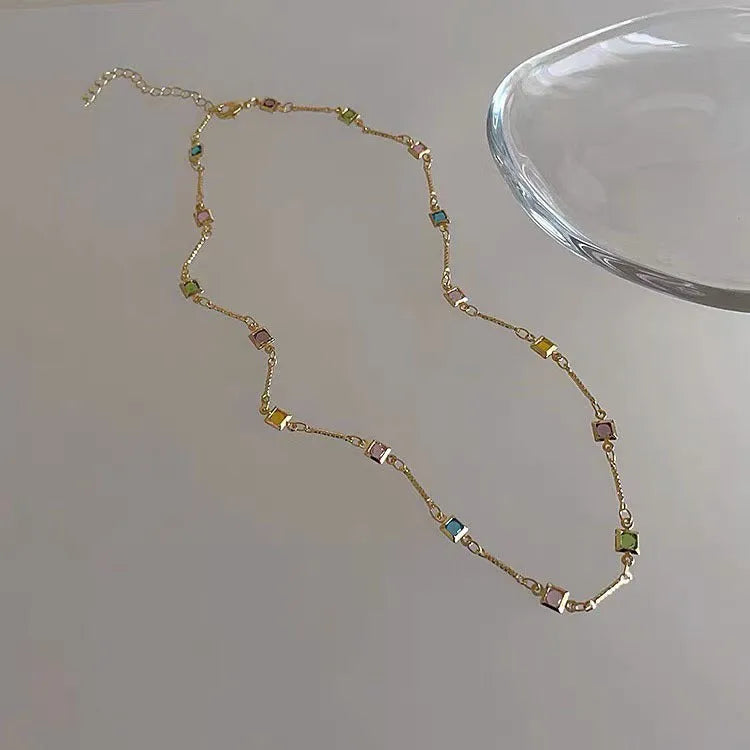 Square colour artificial crystal pendant on gold tone clavicle chain necklace with geometric design