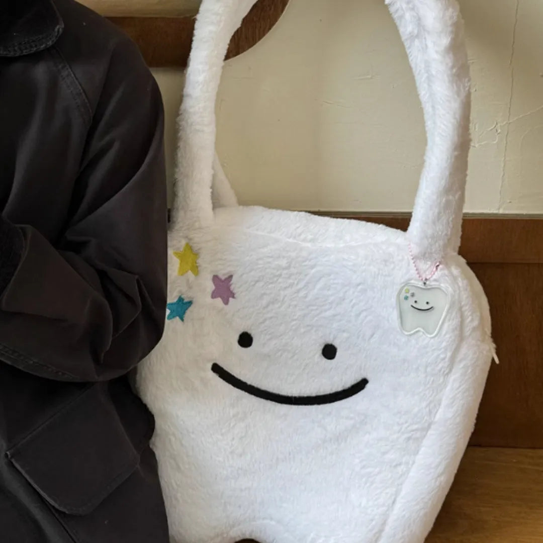 White plush shoulder tote bag with cute teeth pattern and front zip closure