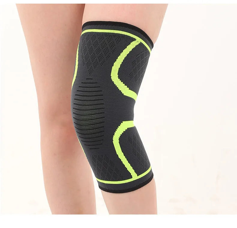 Stretch polyester sports kneepad with corrugated texture in black, shown on a knee.