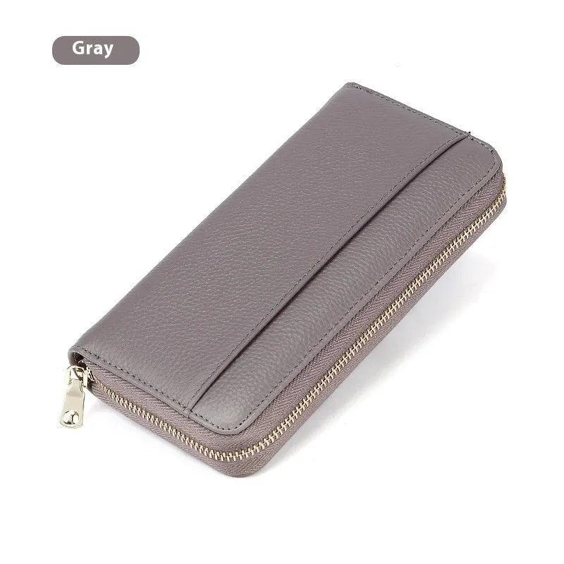 Genuine leather women's wallet showing interior compartments and anti-theft card swiping feature