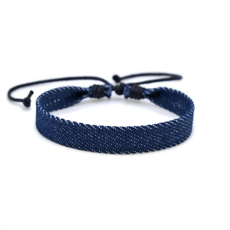 Handmade denim fabric bracelet strap for travel memories, shown in one of eleven colour variants