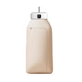 White foldable portable clothes dryer with remote control on countertop
