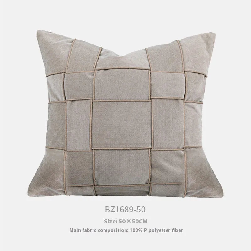 Chenille woven square pillow cushion in beige colour on a sofa