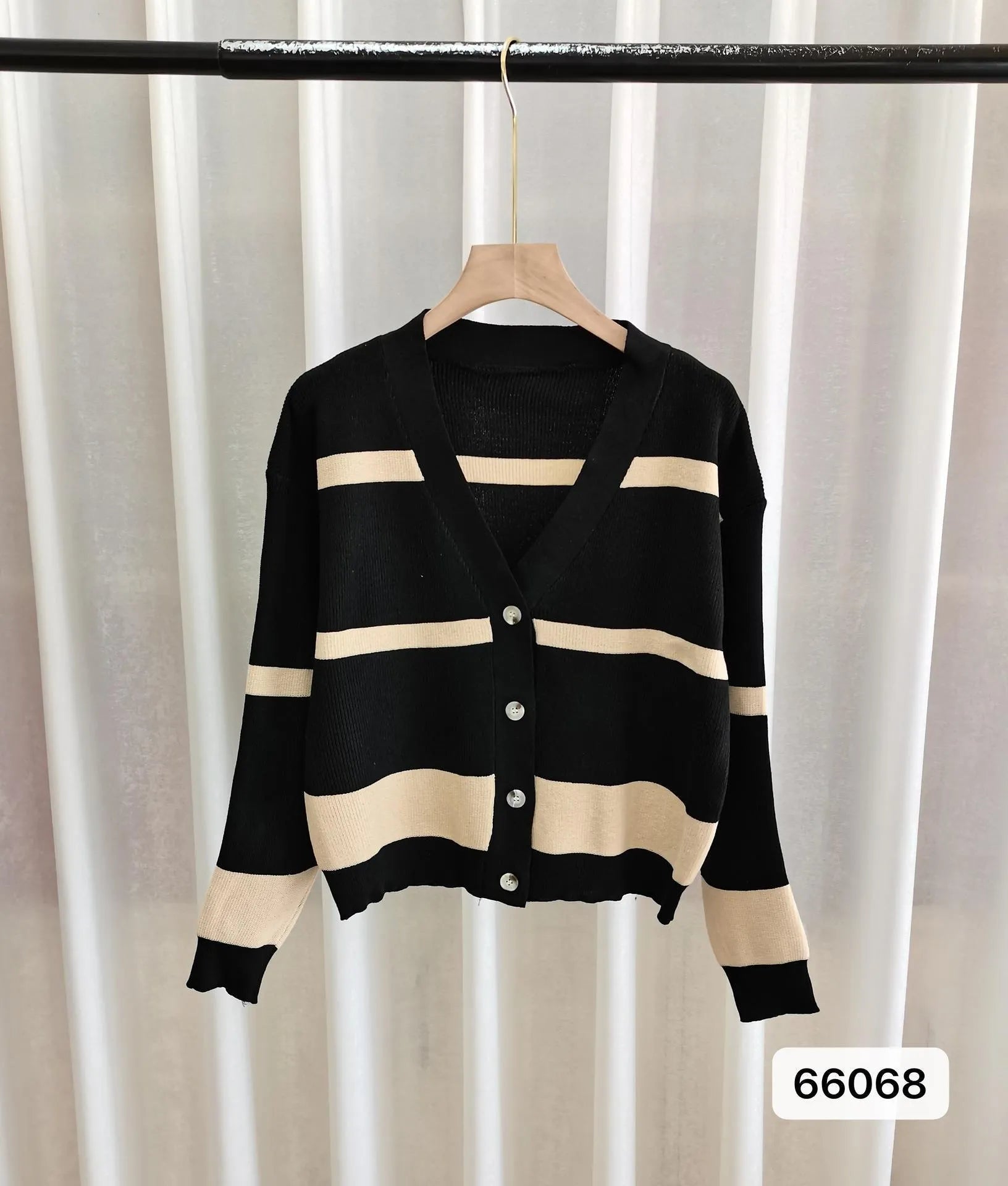 Women's striped V-neck knitted cardigan with 3D pattern in slim fit silhouette