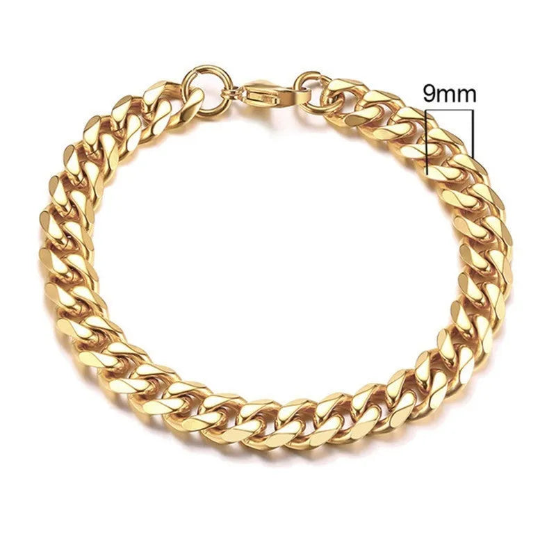 Six-sided geometric link metal bracelet in gold colour on a wrist.