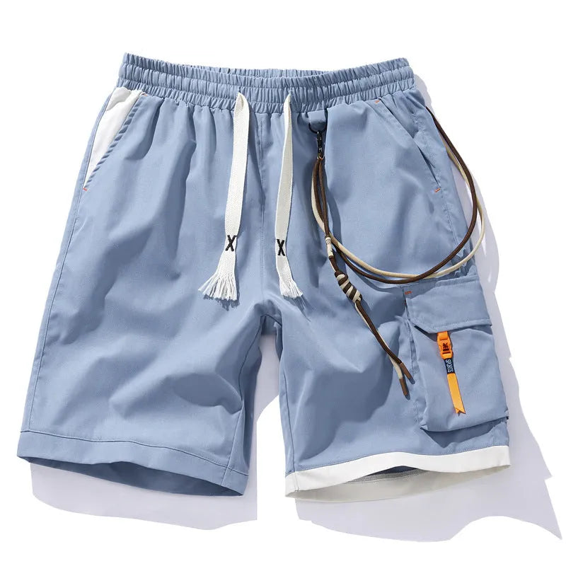 Man wearing loose-fit, high-waisted, cropped sports shorts in bamboo fibre.