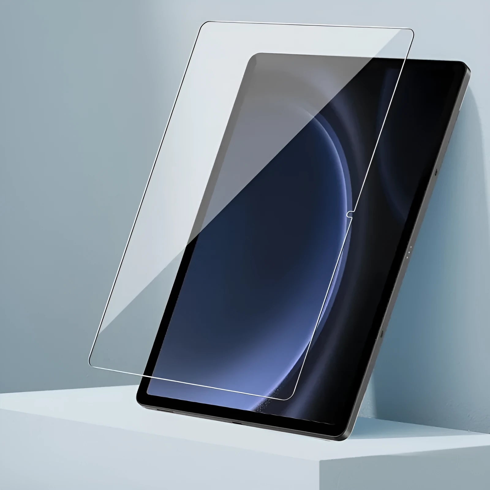 Samsung Galaxy tablet with a clear tempered glass screen protector applied, showing anti-fingerprint coating.