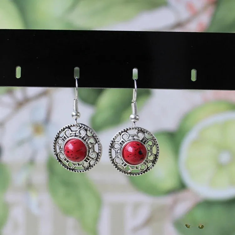 Miao silver retro turquoise flower disk earrings with geometric shape and ethnic patterns