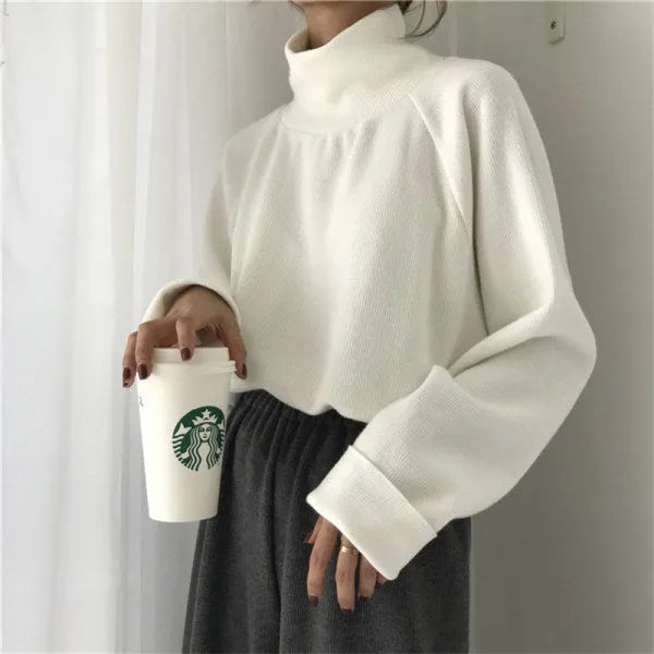 Women's loose fit long sleeve top with half-high collar in solid colour