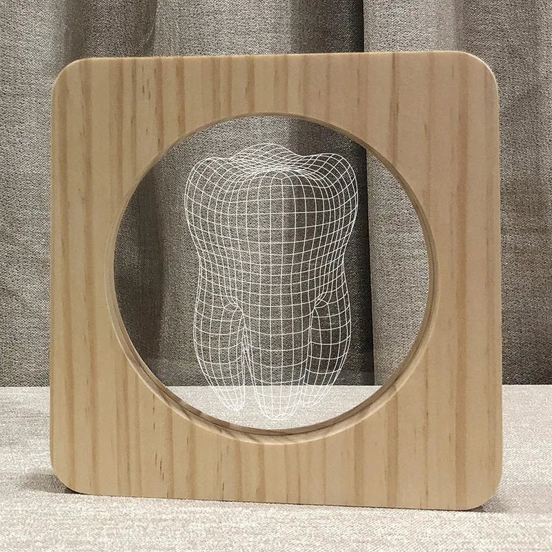 Small tooth-shaped night lamp with log color plastic finish measuring 190x190x30mm