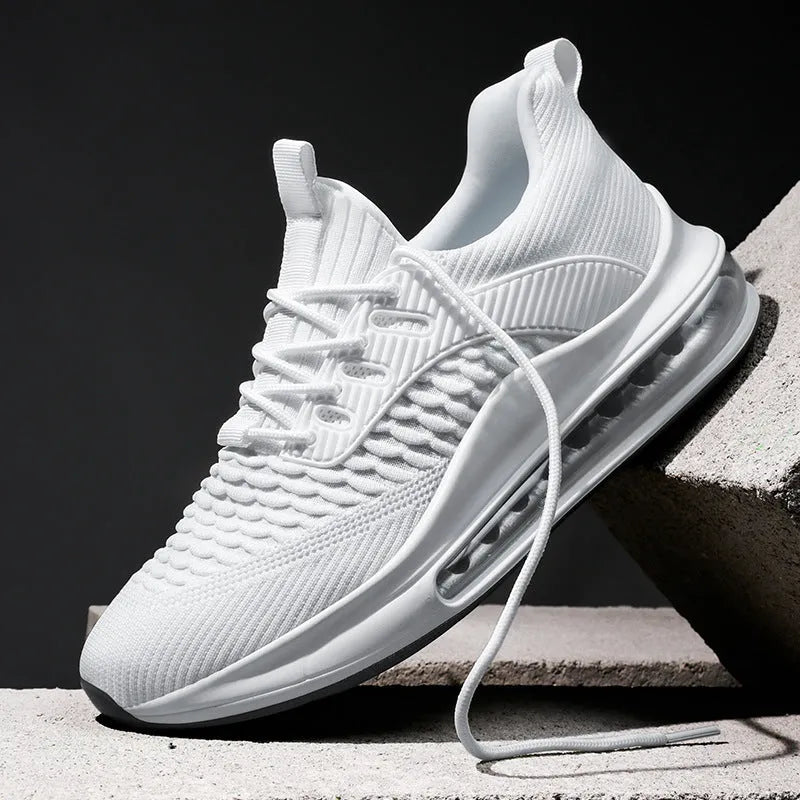Men's low-top black mesh running sneakers with a round toe and lace-up front on a rubber sole.