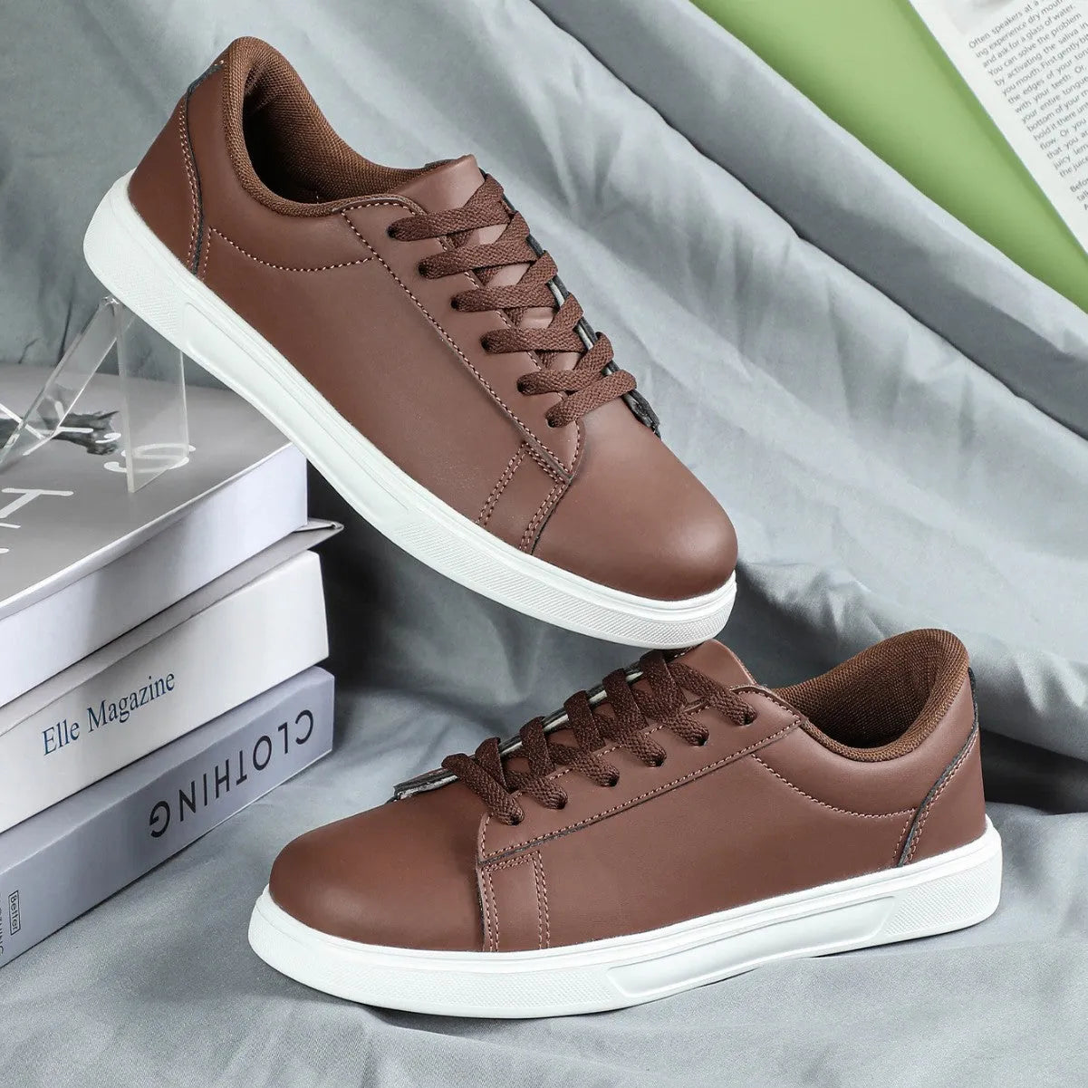 Low-top platform skate shoes with cross-strap detail and mid-heel design in beige brown colour