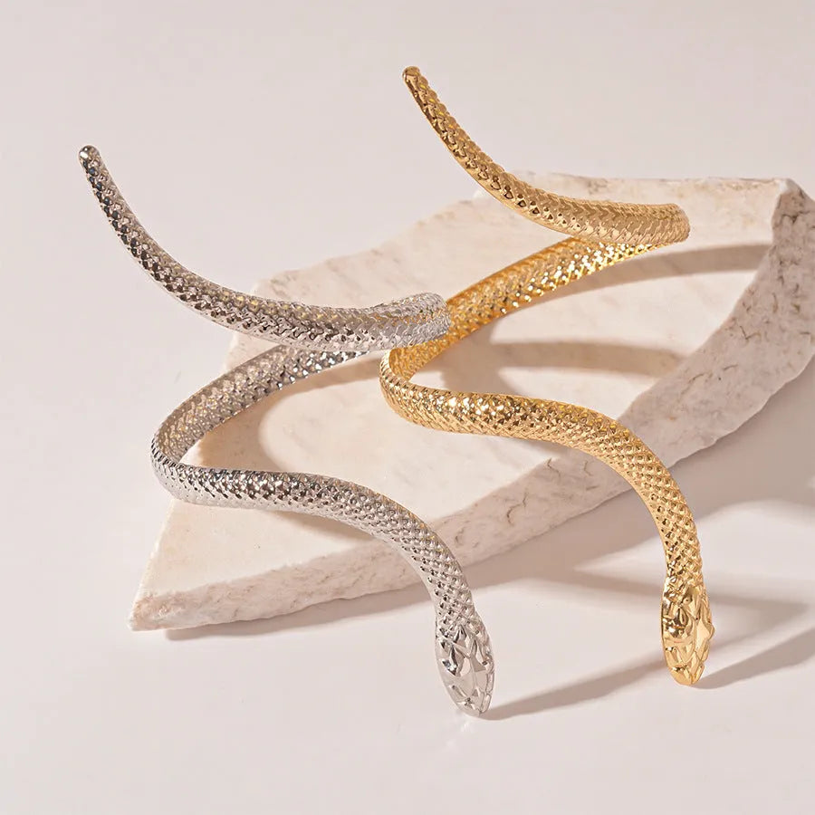 Gold electroplated metal snake design ring and bracelet set with exaggerated twisting