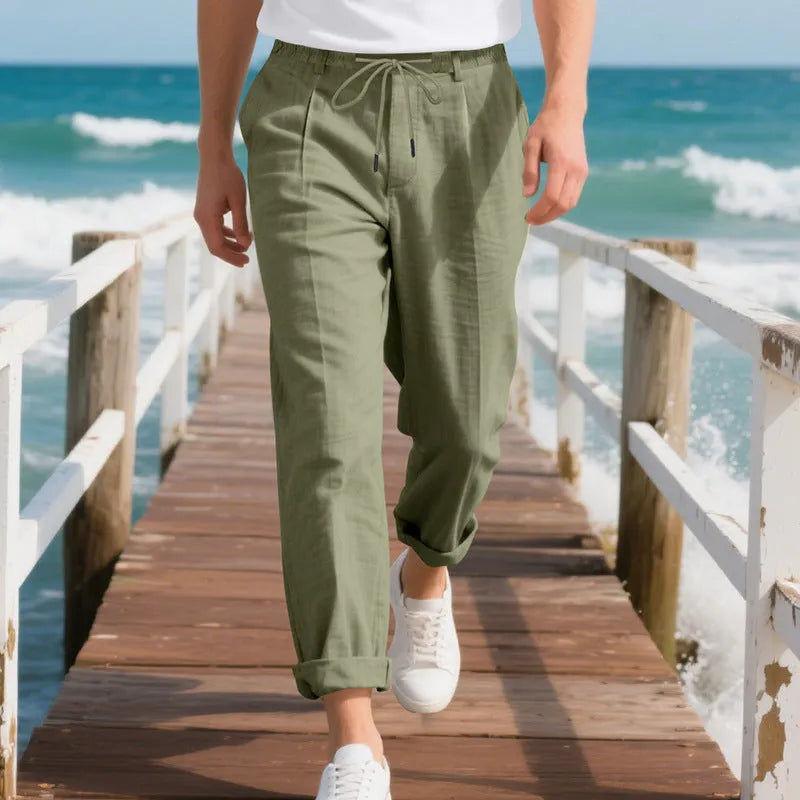 Men's light khaki linen casual trousers with a loose straight-leg fit and drawstring waist.