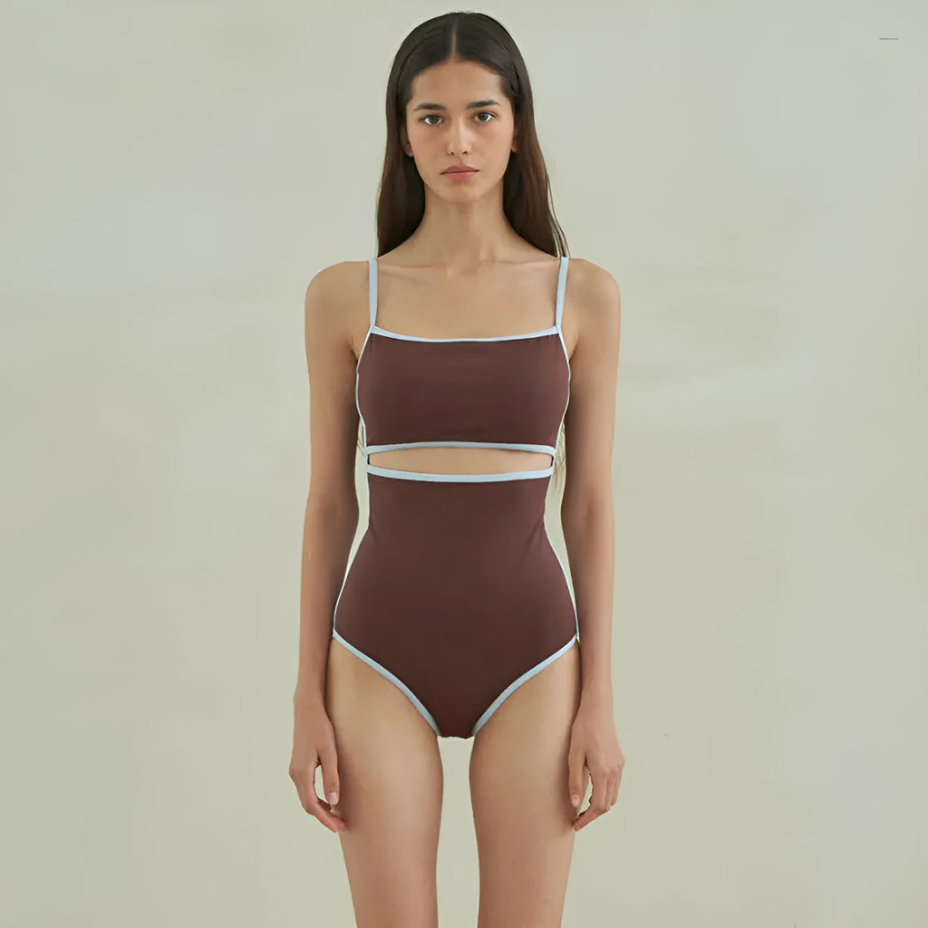 Brown triangle-style one-piece swimsuit for women on a hanger.