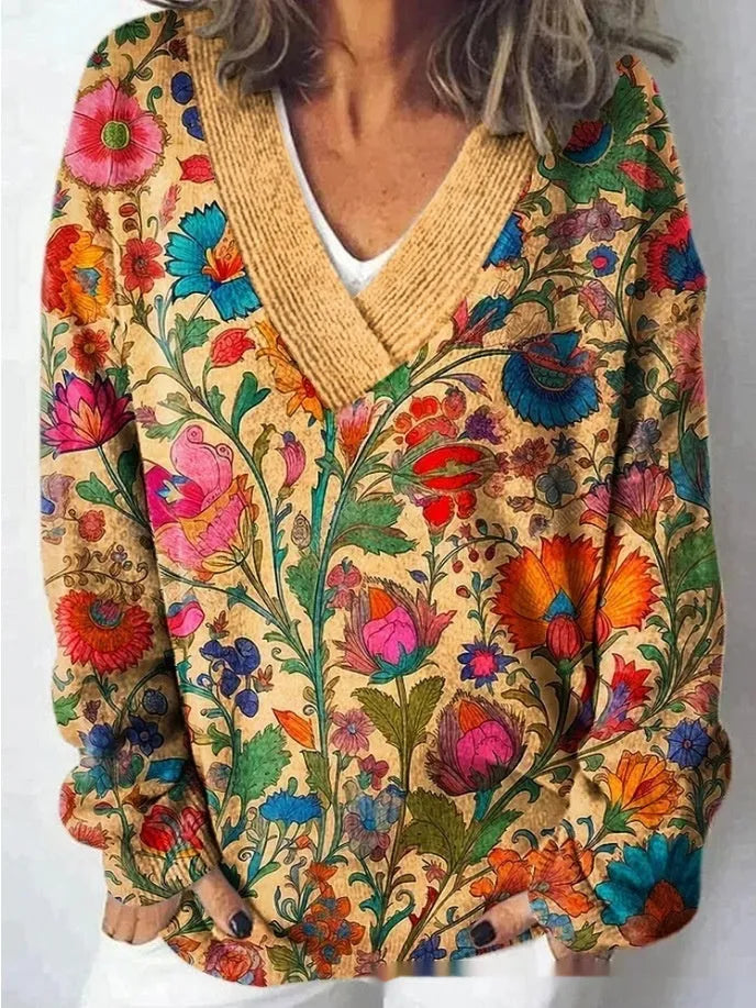 Women's V-neck floral print sweatshirt with long sleeves in wool woven fabric.