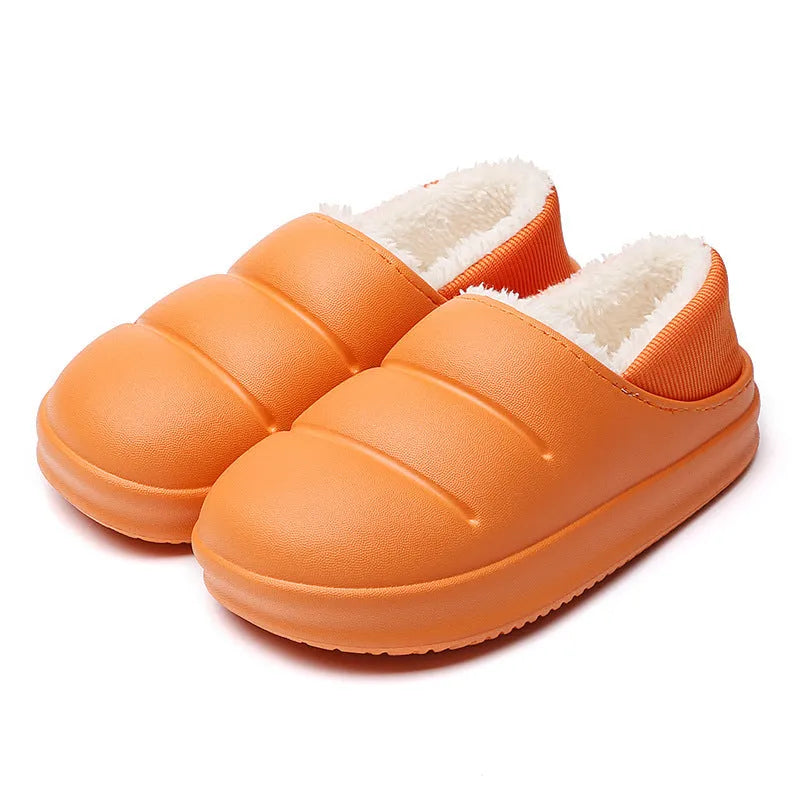 Women's waterproof garden slipper in green with plush lining and a textured non-slip EVA sole.