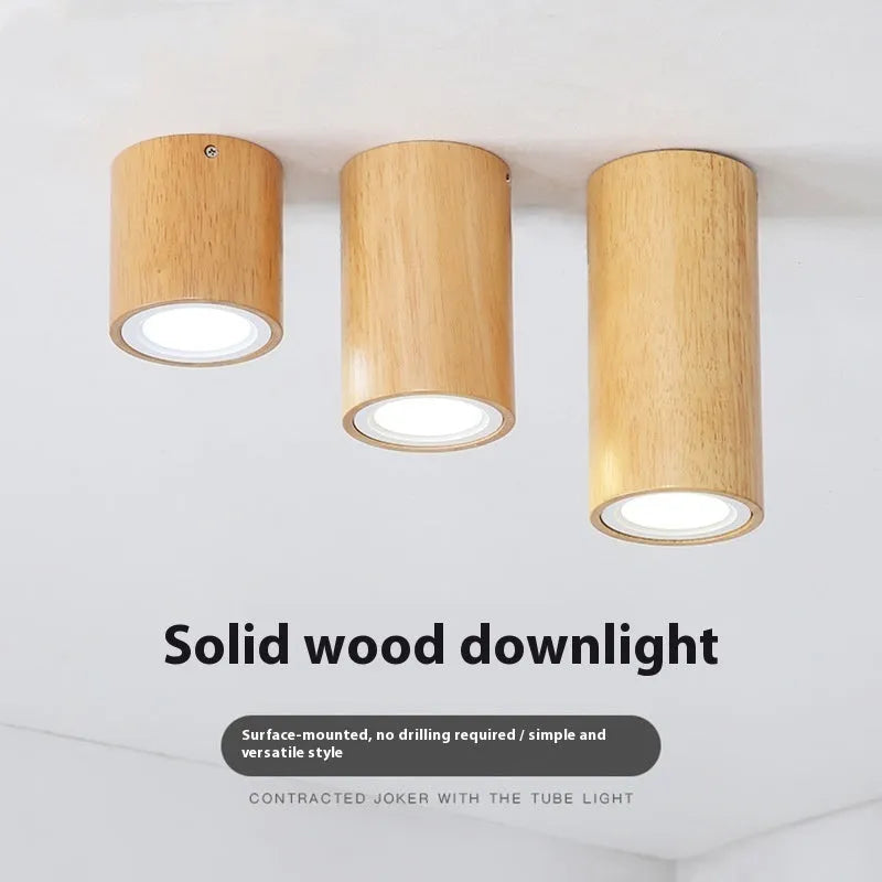 Solid wood surface mounted downlight in wood colour with square or round design options
