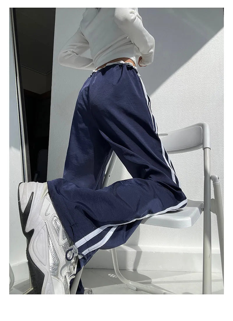 Women's slim-fit drape trousers in thin fabric with low waist and straight leg