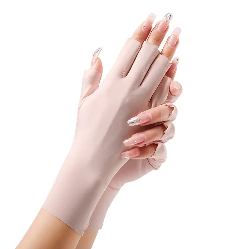 Thin beige women's sunscreen gloves with UPF50+ protection on a hand.
