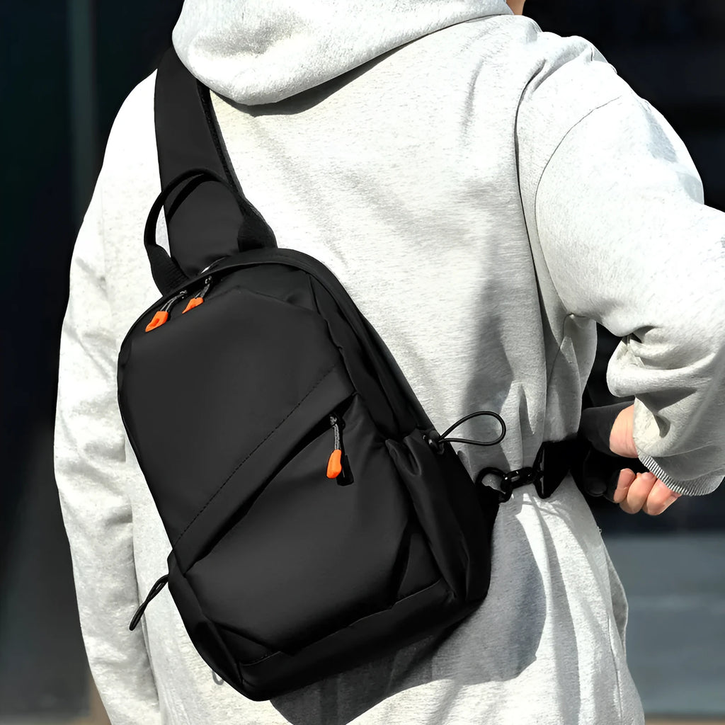 Men's black polyester crossbody bag showing single shoulder strap and simple design