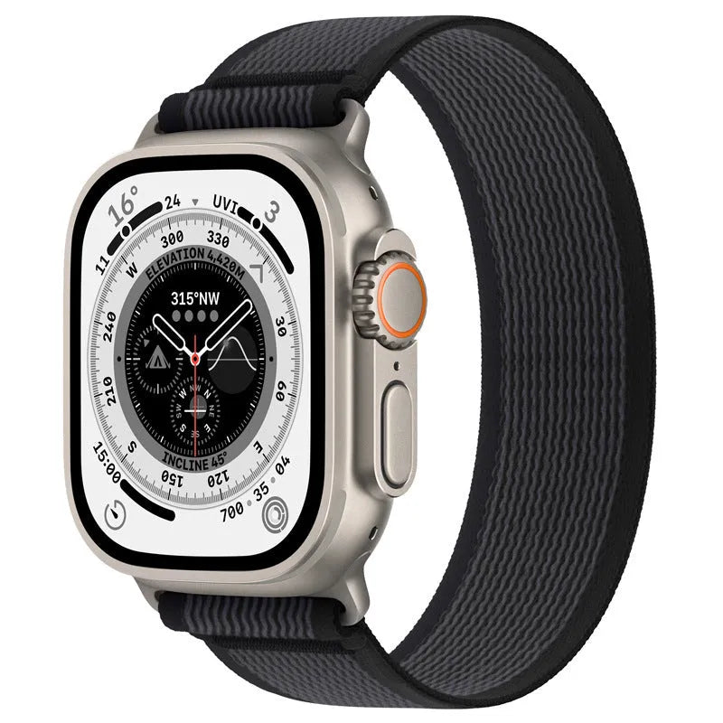 Black nylon Apple Watch band with integrated ring closure on a 44mm watch case.